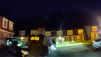 Body camera footage reveals a woman hit multiple cars and drove in the direction of police as she tried to flee officers before they shot at her, inflicting a non-fatal wound.
