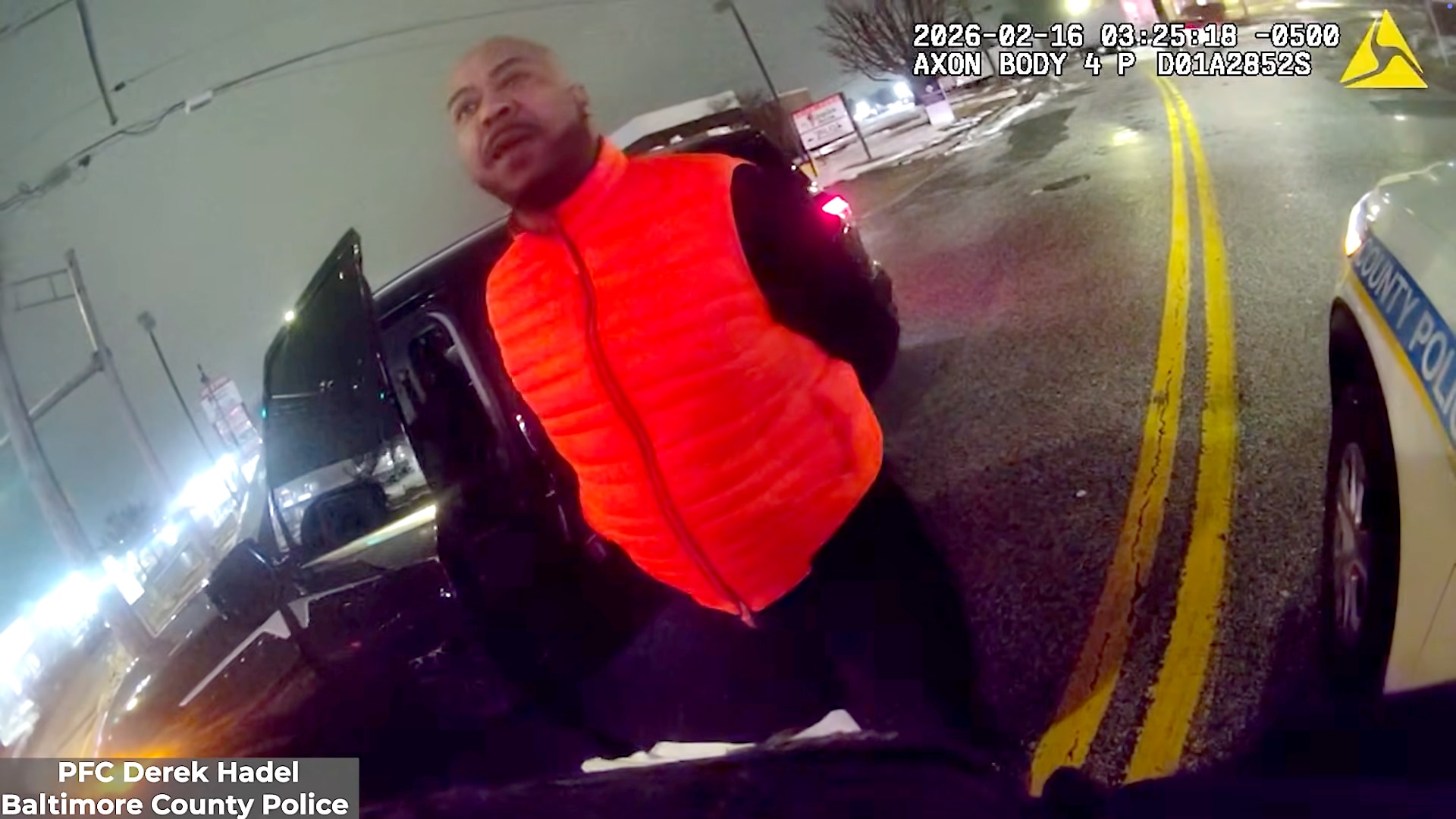 The Maryland Attorney General’s Office released body camera footage showing Samuel “Big Sam” Brown Jr.’s swatting away Baltimore County Police Officer Derek Hadel’s arm twice before he punches Brown twice — knocking him into the asphalt.