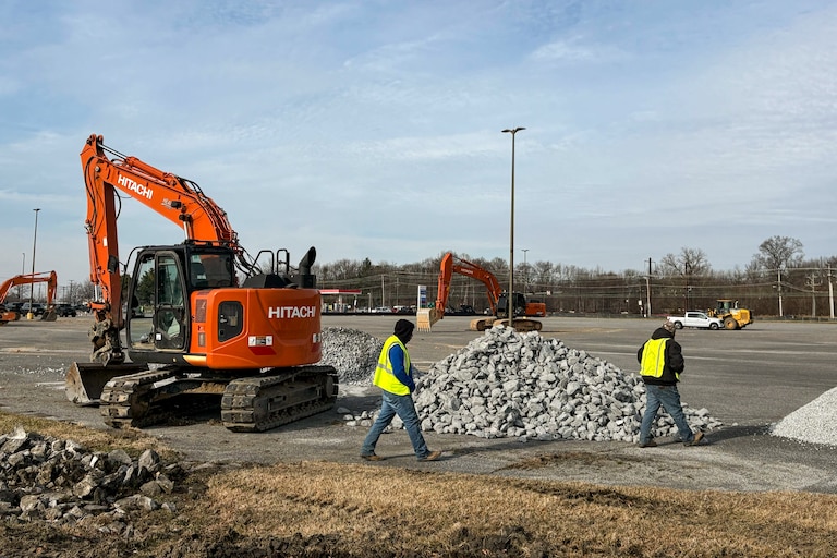 Bulldozers at Wilson Point Road and Eastern Boulevard are transforming open space into a warehouse, which local leader say violates the zoning.