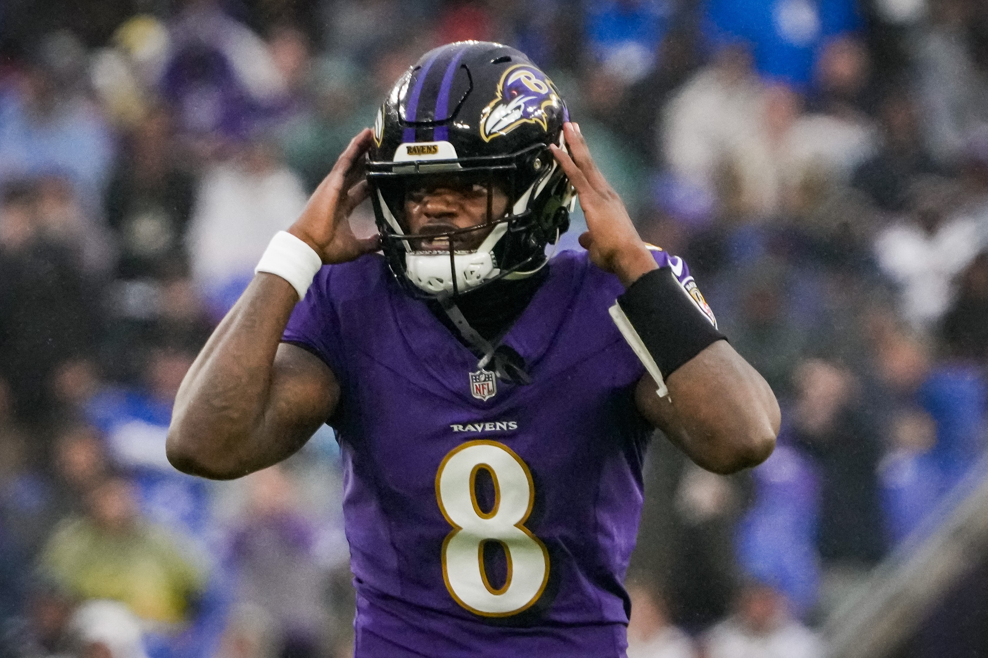 Ravens quarterback Lamar Jackson calls a play during the second quarter against the Los Angeles Rams at M&T Bank Stadium.