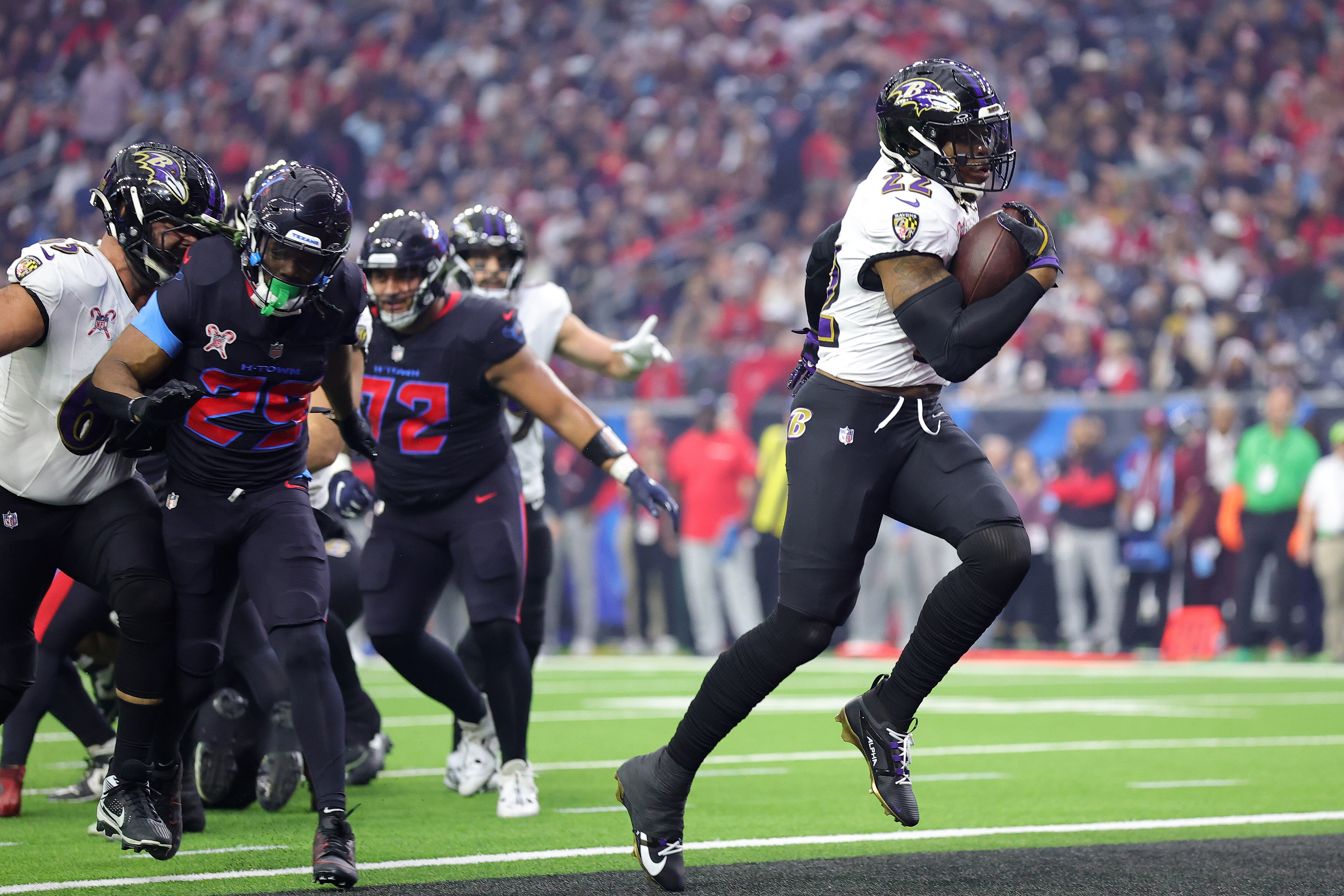 Ravens running Derrick Henry scores a touchdown against the Texans last season. Henry finished a 31-2 win with 147 yards on 27 carries.