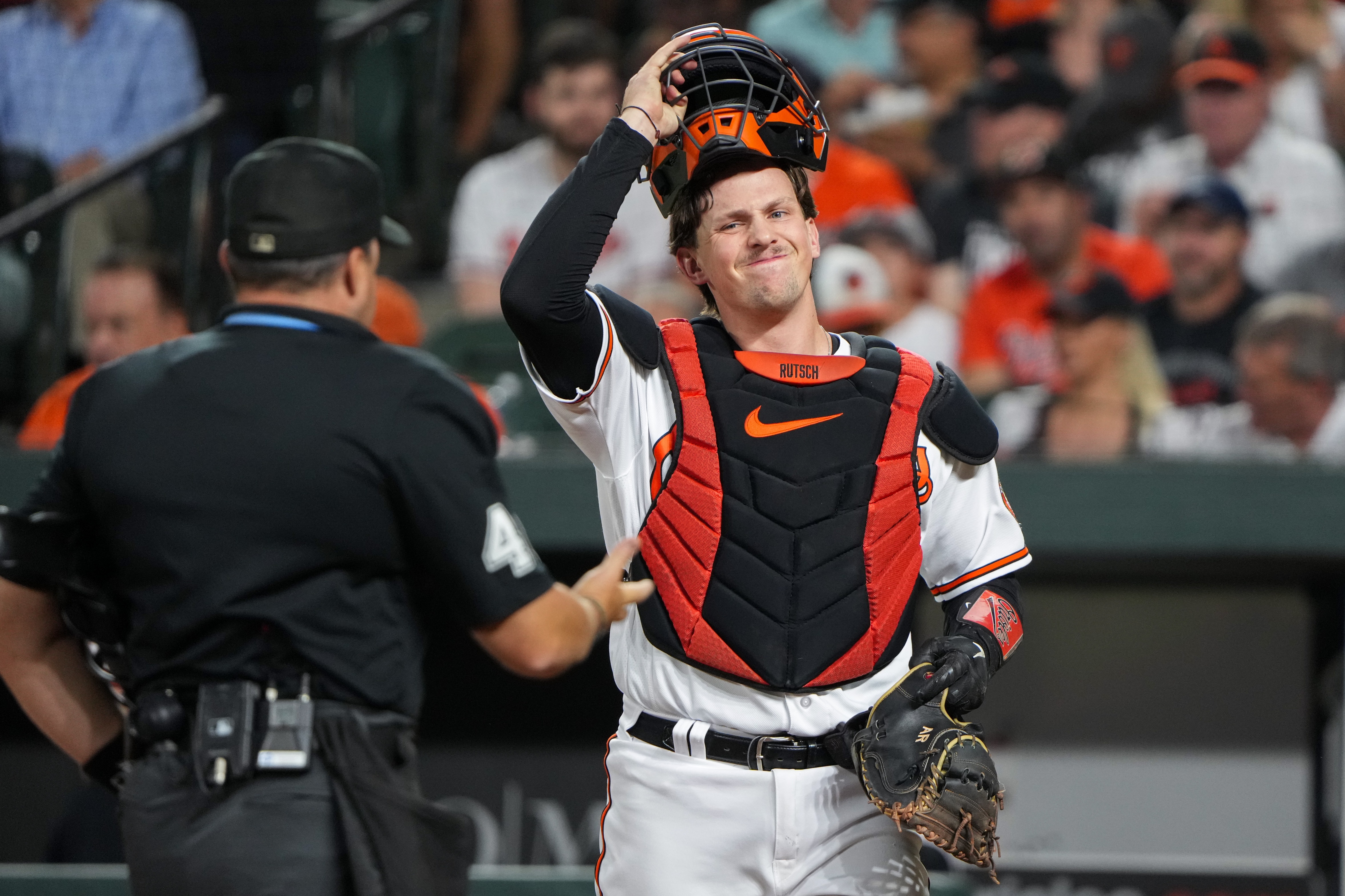 Baltimore Orioles catcher Adley Rutschman (35) adjusts his catcher’s mask in the first inning of a baseball game against the Tampa Bay Rays on Thursday, September 14, 2023.
