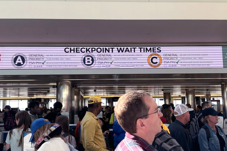 SATURDAY, MARCH 28, 2026 - Inside Baltimore/Washington International Thurgood Marshall Airport, the screen with wait times estimates show no numbers. Instead, it reads: “We are experiencing longer than normal wait times. We apologize any inconvenience. Thank you for flying with BWI.”