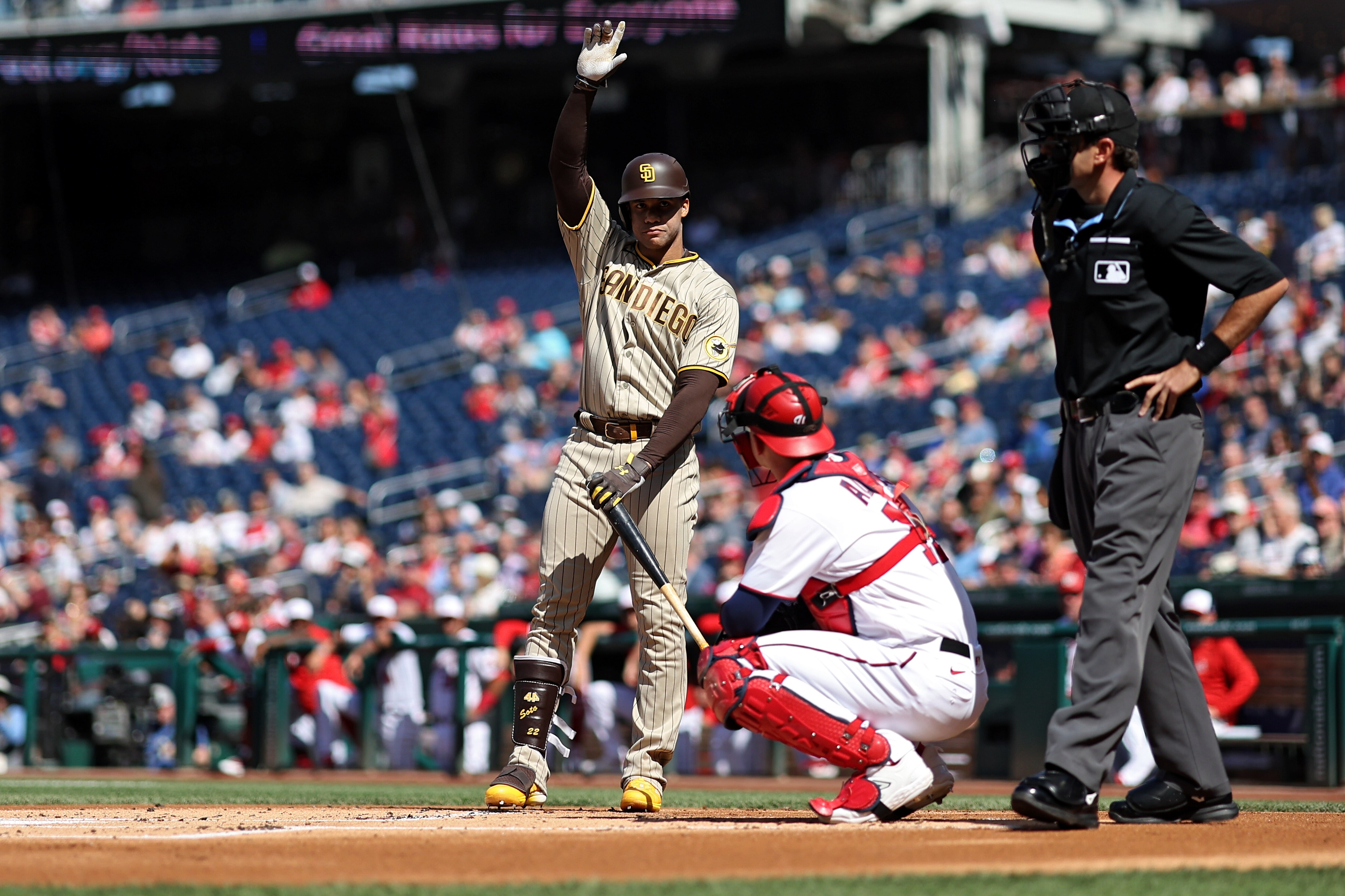 WASHINGTON, DC - MAY 25: Juan Soto #22 of the San Diego Padres acknowledges the crowd before batting against the Washington Nationals during the first inning at Nationals Park on May 25, 2023 in Washington, DC.