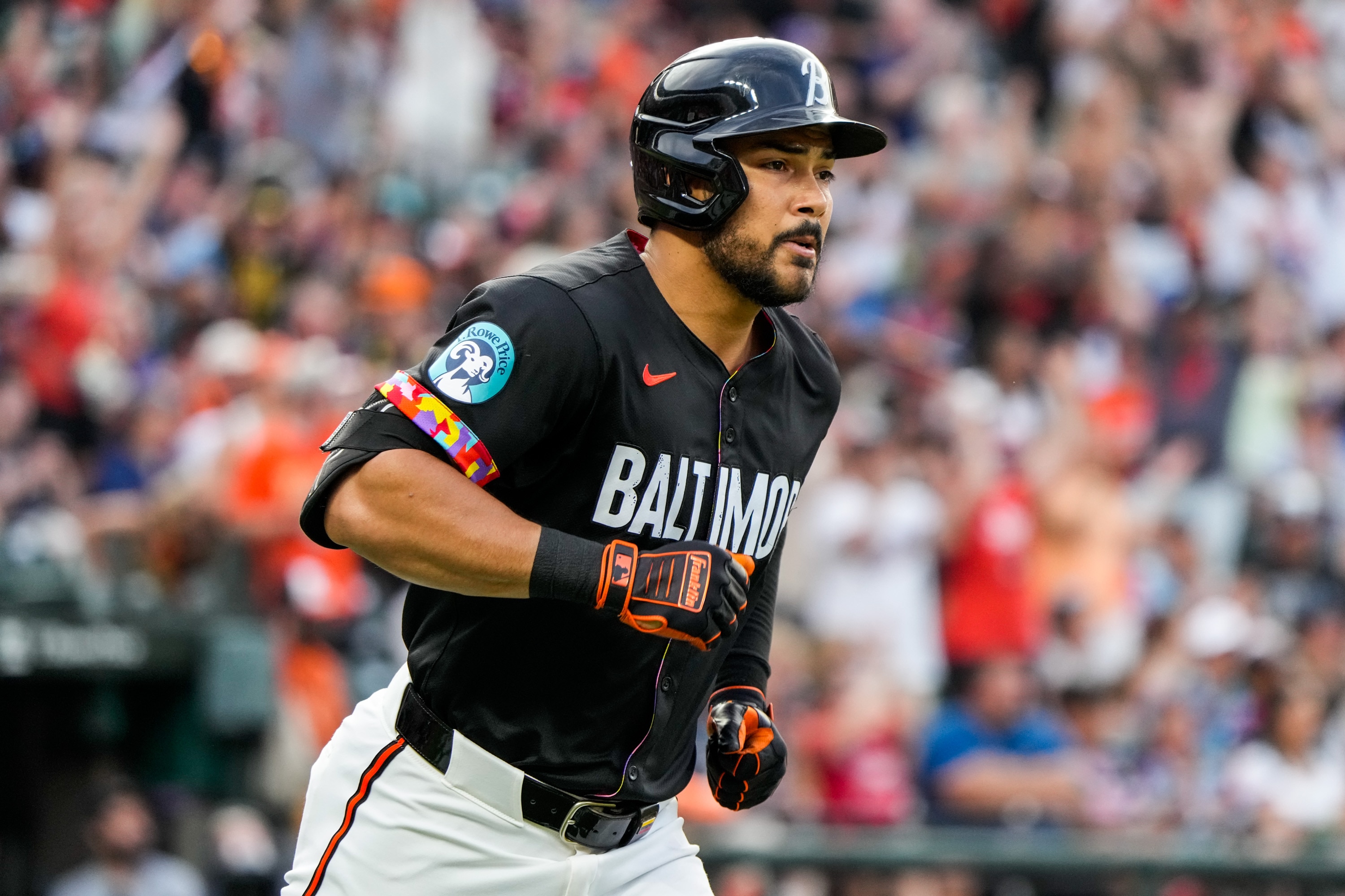 Baltimore Orioles outfielder Anthony Santander (25) runs to first base in the third game of a series against the Texas Rangers at Camden Yards on June 29, 2024.