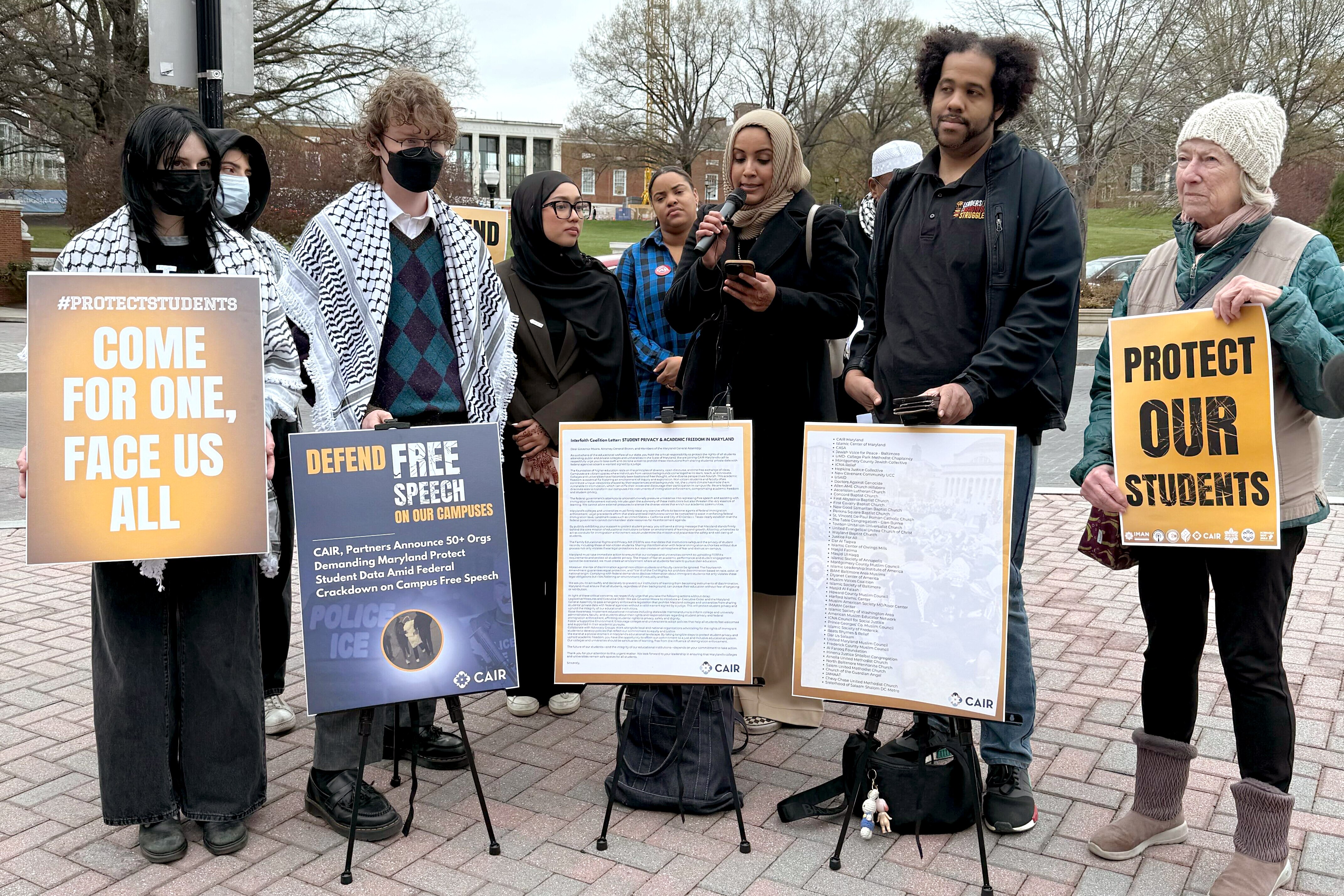 Johns Hopkins University students and religious leaders gather on Wednesday, April 2, 2025, to announce petition to protect students from ICE.