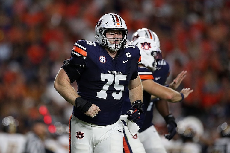 Auburn Tigers center Connor Lew runs on the field during the team's game against the Missouri Tigers on Oct. 18, 2025.