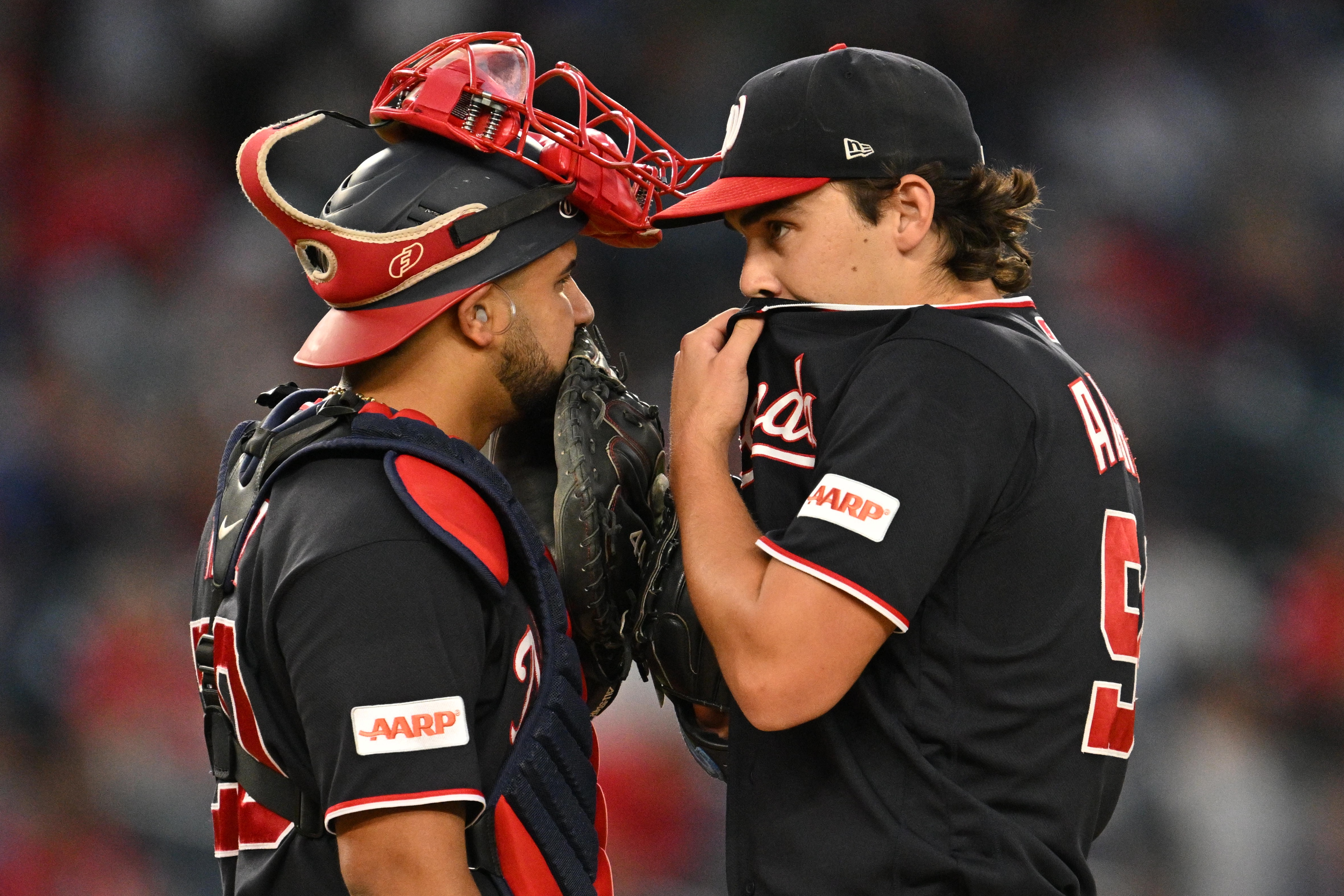 WASHINGTON, DC - SEPTEMBER 25:  Catcher Keibert Ruiz #20 of the Washington Nationals talks with pitcher Andrew Alvarez #54 on the mound during the first inning against the New York Mets at Nationals Park on September 25, 2026 in Washington, DC.  (Photo by Jamie Sabau/Getty Images)