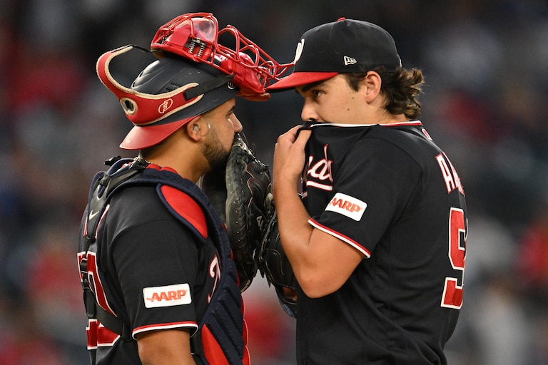 WASHINGTON, DC - SEPTEMBER 25: Catcher Keibert Ruiz #20 of the Washington Nationals talks with pitcher Andrew Alvarez #54 on the mound during the first inning against the New York Mets at Nationals Park on September 25, 2026 in Washington, DC. (Photo by Jamie Sabau/Getty Images)