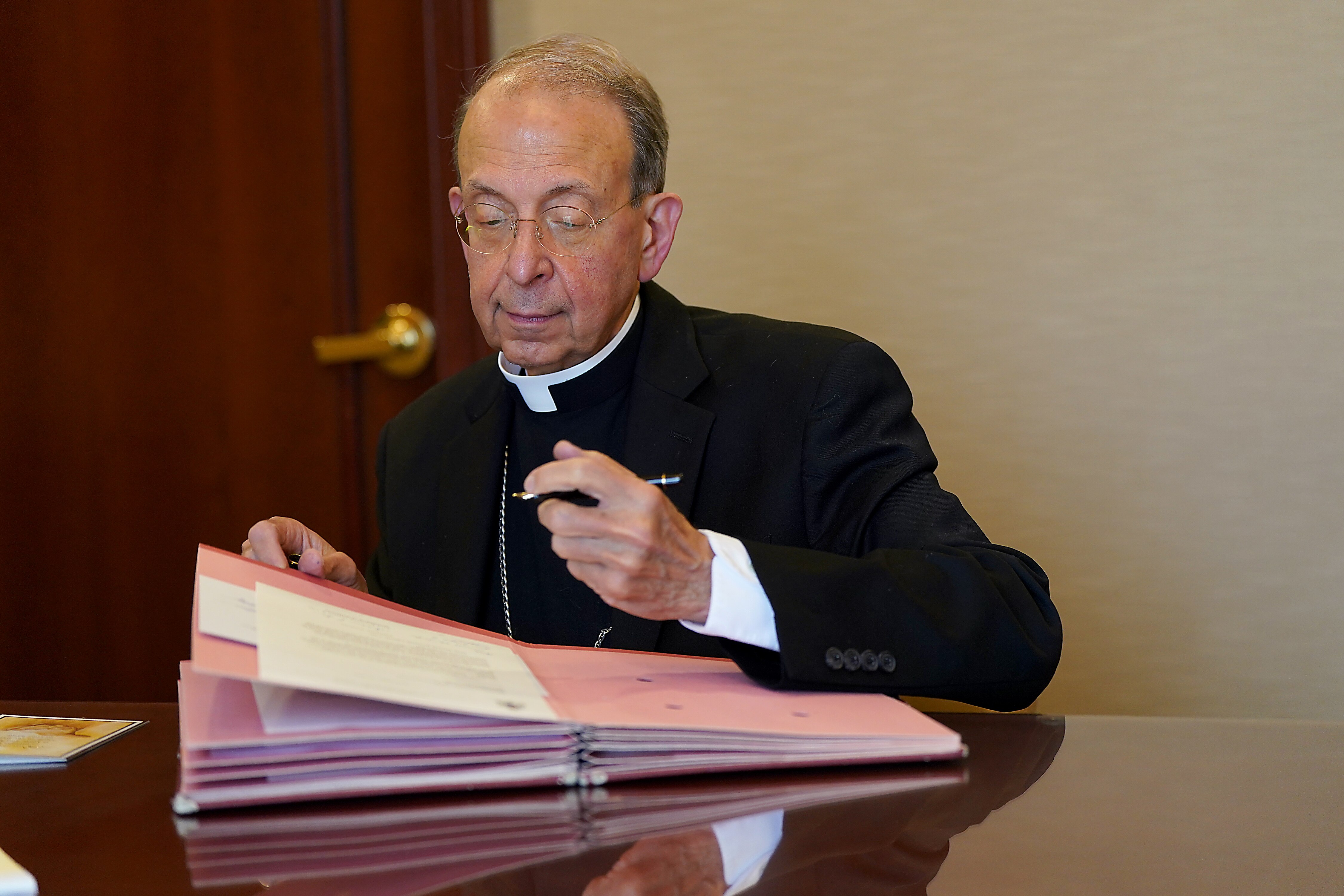 Archbishop William Lori is shown in his conference room in September 2023.