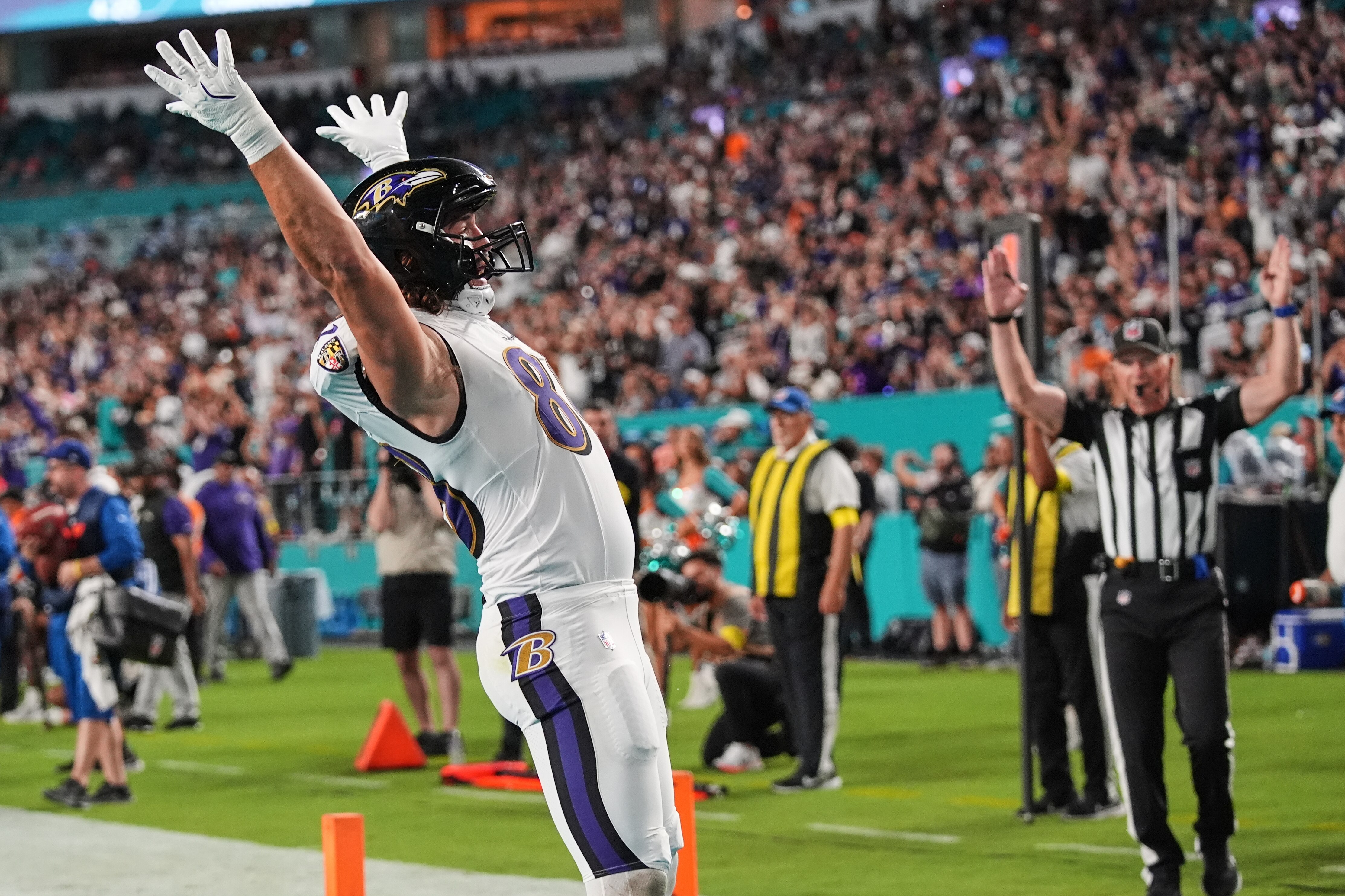 Baltimore Ravens tight end Charlie Kolar (88) celebrates after scoring a touchdown during the second half of an NFL football game against the Miami Dolphins, Thursday, Oct. 30, 2025, in Miami Gardens, Fla.