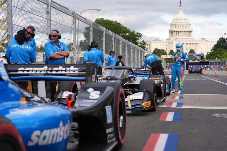 Race car diver Scott McLaughlin gets out of his car after a qualifying race prior to Sunday's Freedom 250 Grand Prix auto race in Washington, Saturday, Aug. 22, 2026.(AP Photo/Alex Brandon)
