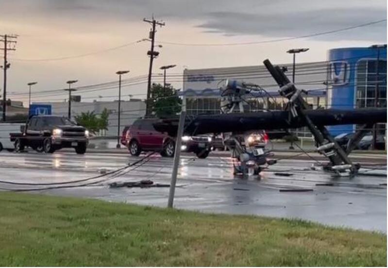 Dozens of people became trapped in their cars on Route 140 in Westminster after a powerful storm knocked down more than 30 utility poles on Monday, Aug. 7, 2023.