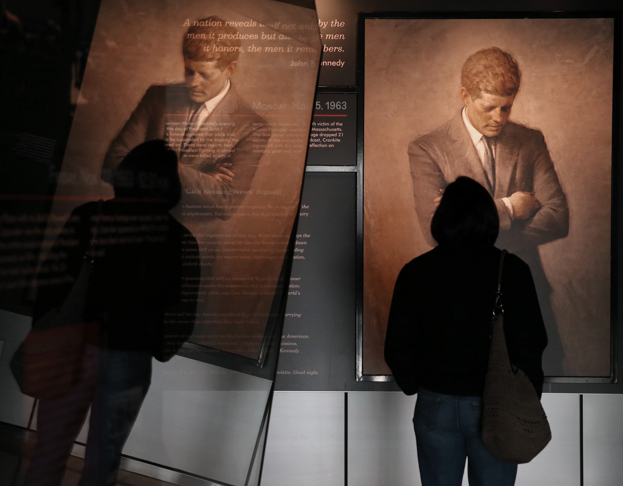 WASHINGTON, DC - NOVEMBER 22:  People tour an exhibit at the Newseum dedicated to John F. Kennedy who was killed fifty years ago today, on November 22, 2013, in Washington, DC. Today is the 50th anniversary of President Kennedy's assassination during his visit to Dallas, Texas, in 1963.  (Photo by Mark Wilson/Getty Images)