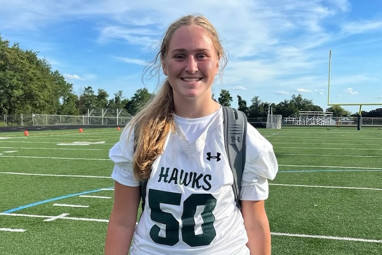 Peyton Dawson poses in her North Harford junior varsity football uniform.