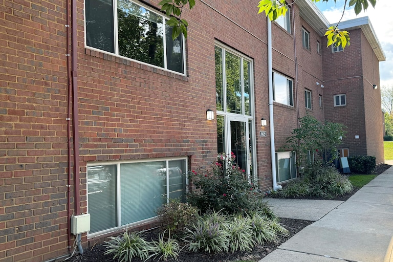 Baltimore County Police arrested 17 people in a unit in the Cardiff Hall Apartments after a non-fatal shooting in Towson led officers to the Apartments where they found a cache of guns.