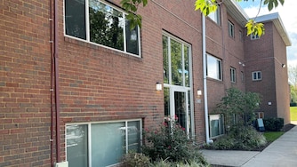 Baltimore County Police arrested 17 people in a unit in the Cardiff Hall Apartments after a non-fatal shooting in Towson led officers to the Apartments where they found a cache of guns.
