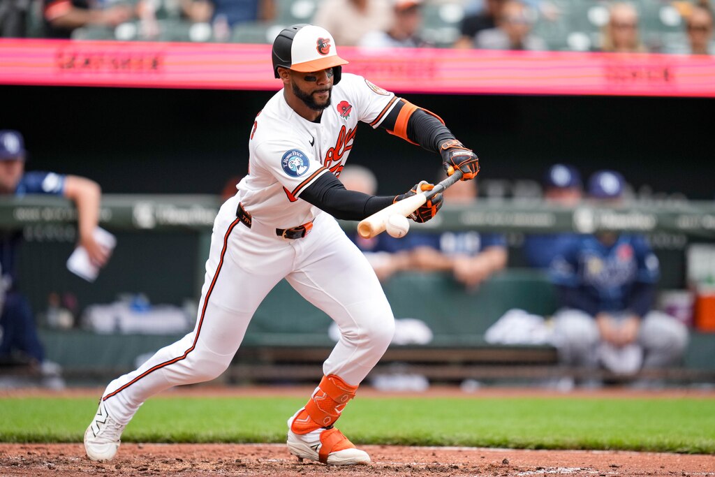 Baltimore Orioles center fielder Leody Taveras (30) singles on a bunt in the fifth inning of a baseball game against the Tampa Bay Rays at Oriole Park at Camden Yards in Baltimore, Md. on Monday, May 25, 2026.
