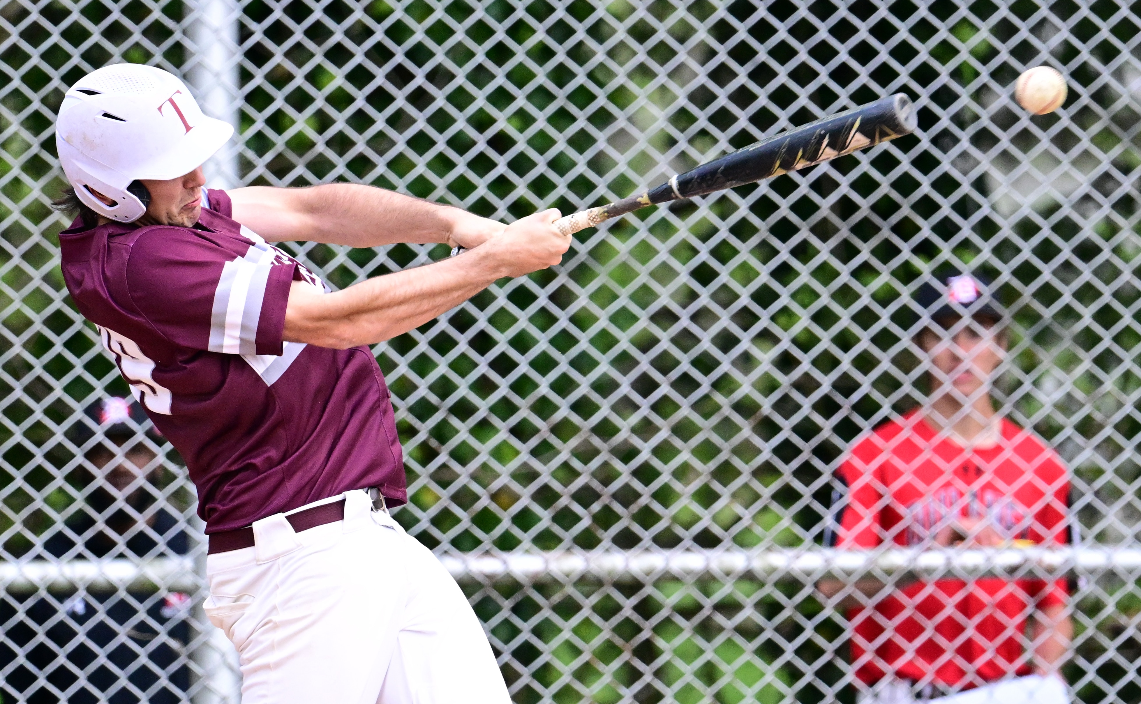Towson's Adam Decker connects on a pitch that ended up over the left centerfield fence Tuesday afternoon against Dulaney in a key Baltimore County Division I contest. Decker's blast along with his effort on the mound and Aziz Bishop's solo shot lifted the Generals to a 3-1 victory over the 14th-ranked Lions.