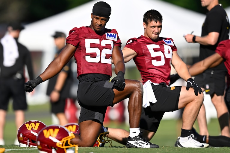 Washington Commanders linebackers Sonny Styles (52) and Leo Chenal (54) work out during practice on July 30.