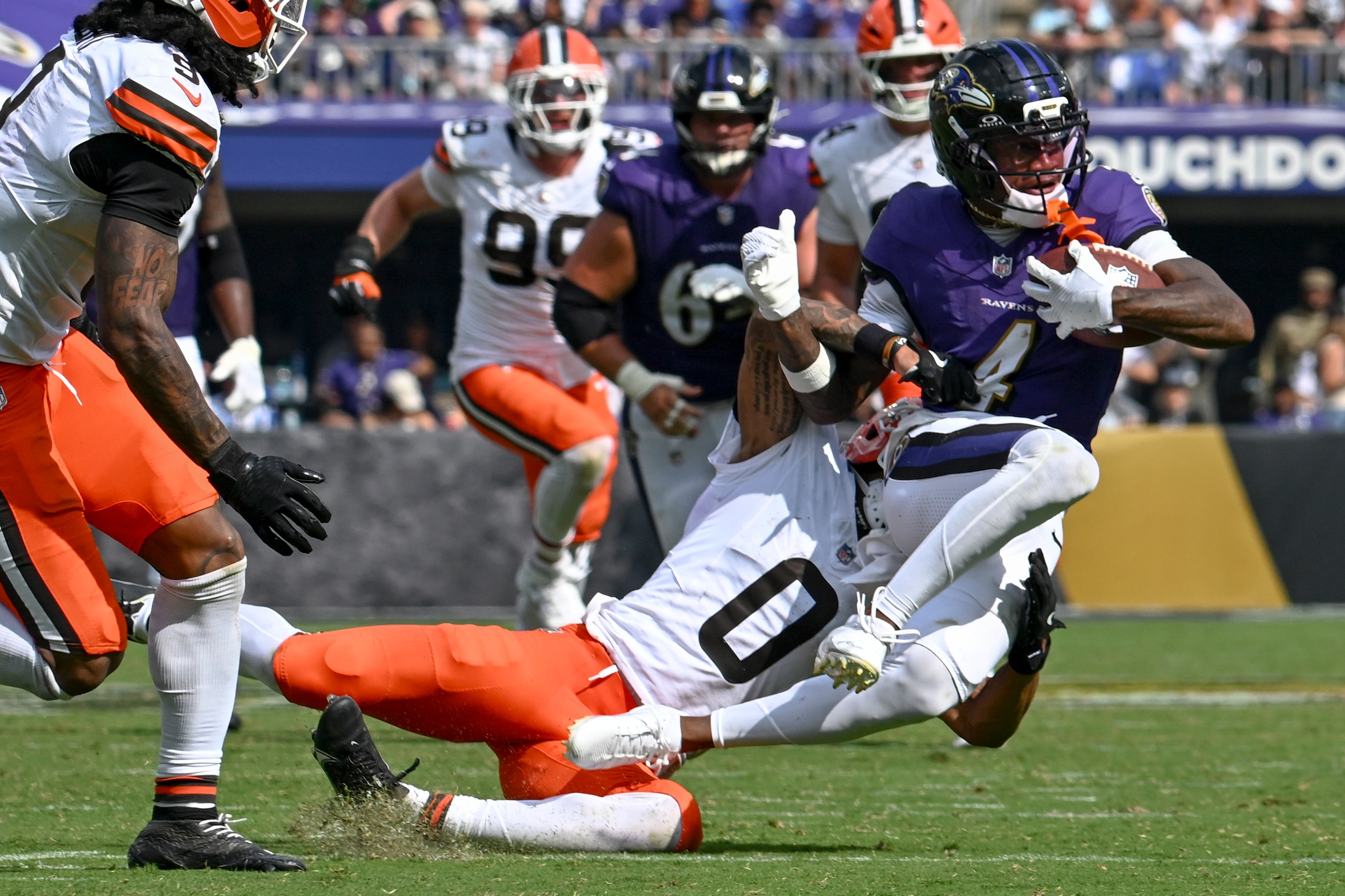 Browns cornerback Greg Newsome II tackles Ravens wide receiver Zay Flowers during the teams’ first meeting this season.