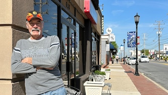 Bill Trentler poses on Frederick Road in Catonsville along the route where he delivered packages for over two decades. He retired from UPS on April 24.