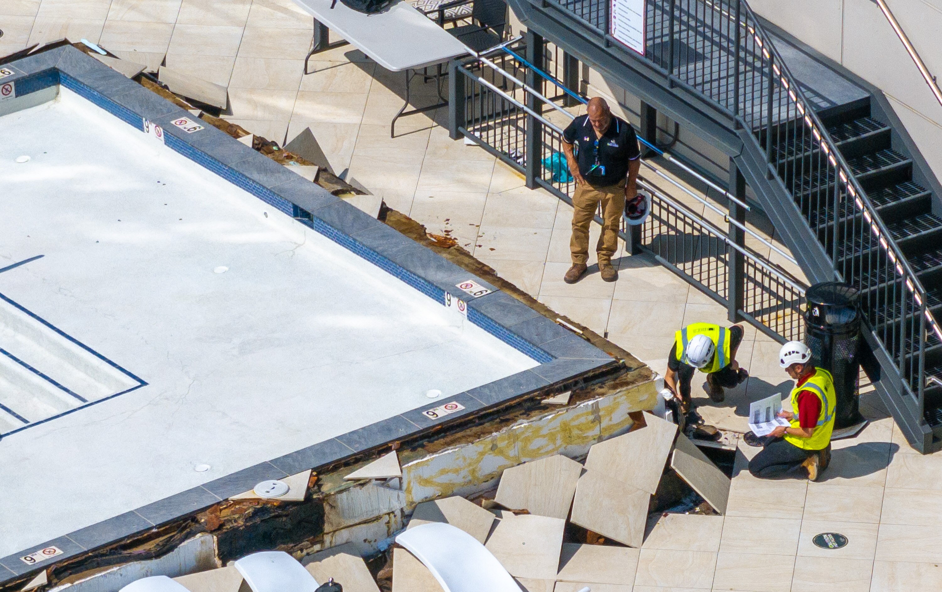 The pool at the Axel Brewers Hill apartment complex was in a “vault” that was separate from the main structure of the building, so the building remains safe, an engineering firm said after an investigation.