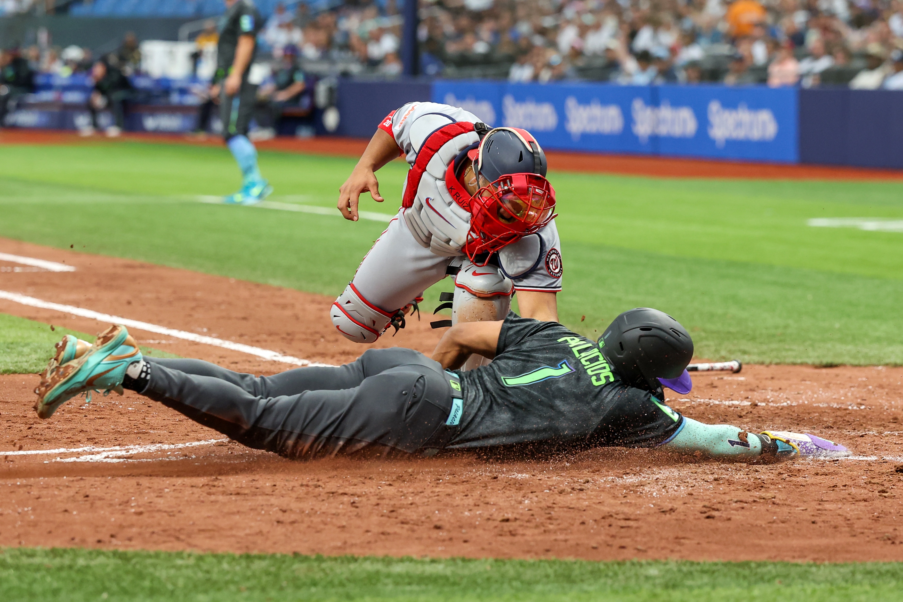 Nationals catcher Keibert Ruiz tags out Richie Palacios of the Rays during the third inning Saturday.
