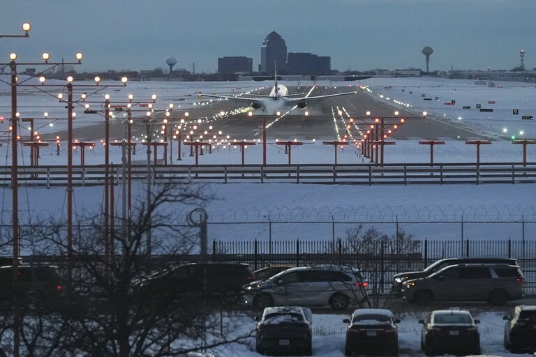 FILE - An American Airlines plane arrives at the O'Hare International Airport in Chicago, Sunday, Nov. 30, 2025. (AP Photo/Nam Y. Huh, File)