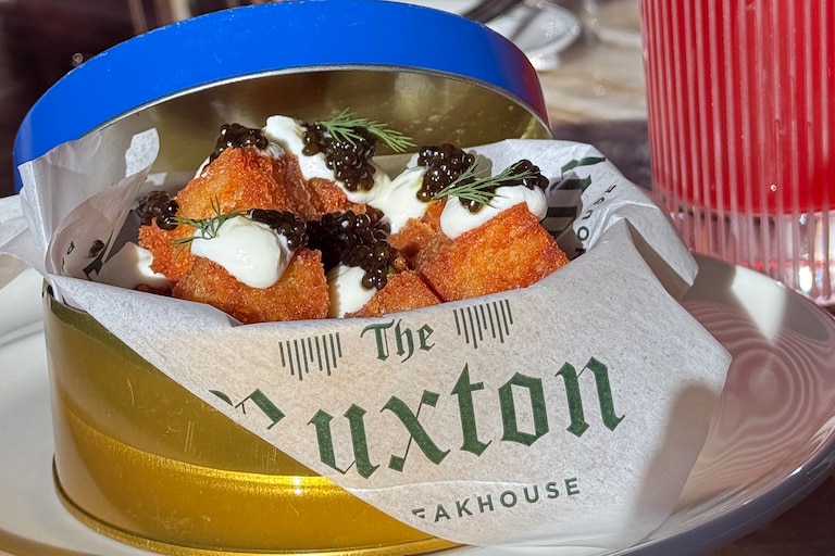 The Ruxton in Harbor East serves house-made tater tots topped with Kaluga caviar, chives, dill, aged provolone and crème fraîche.