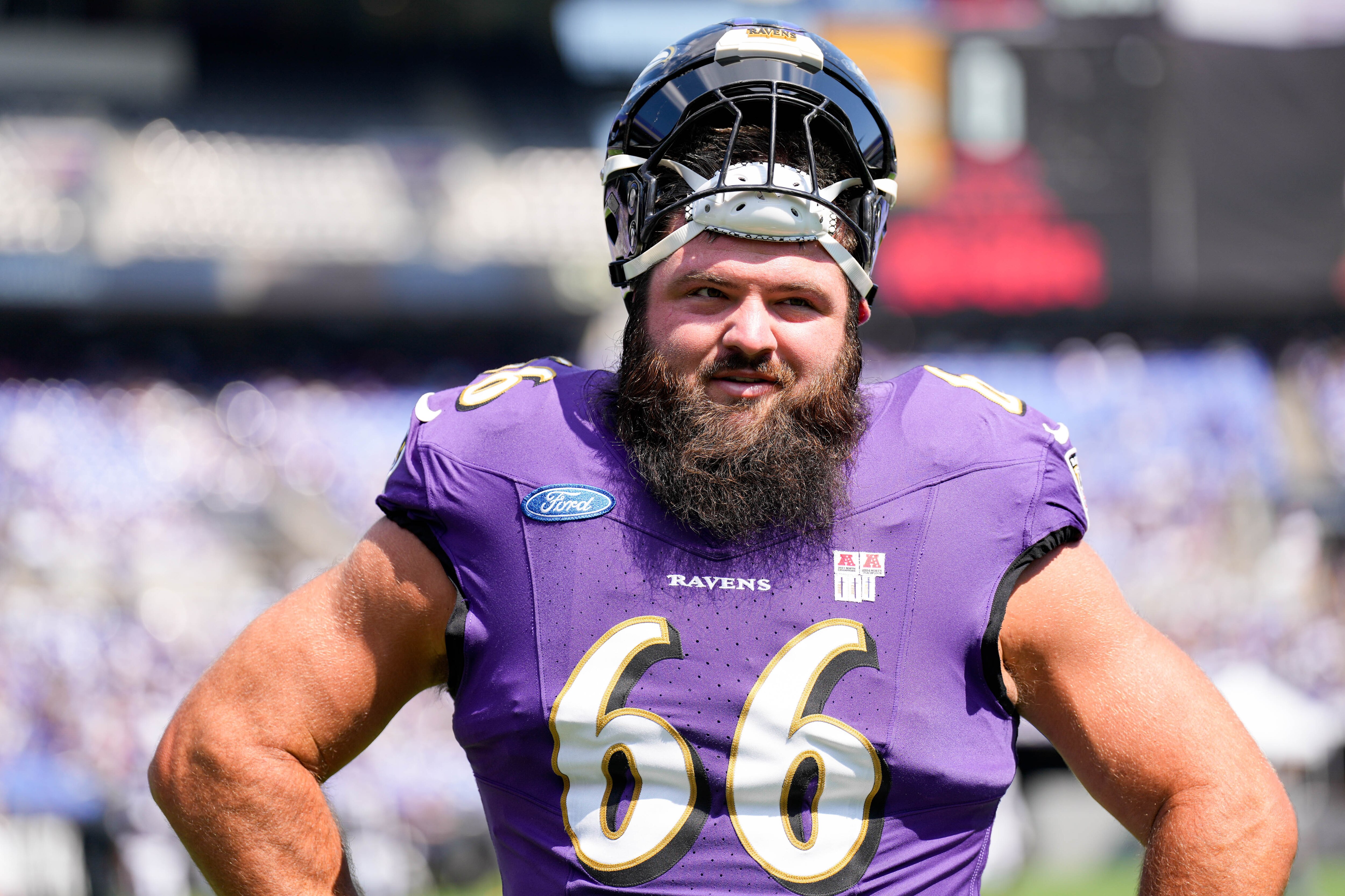 Former Ravens guard Ben Cleveland (66) prepares for a drill during the team’s training camp practice at M&T Bank Stadium on Aug. 3.