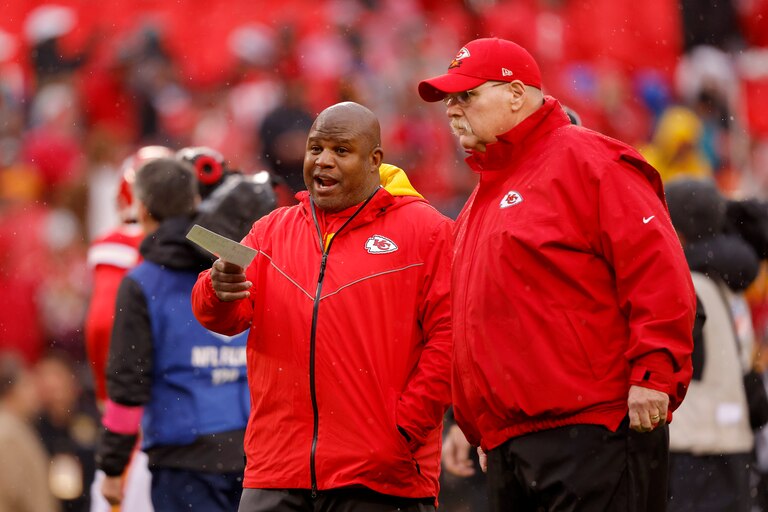 KANSAS CITY, MISSOURI - JANUARY 21: (L-R) Offensive Coordinator Eric Bieniemy talks with head coach Andy Reid of the Kansas City Chiefs prior to the AFC Divisional Playoff game against the Jacksonville Jaguars at Arrowhead Stadium on January 21, 2023 in Kansas City, Missouri.