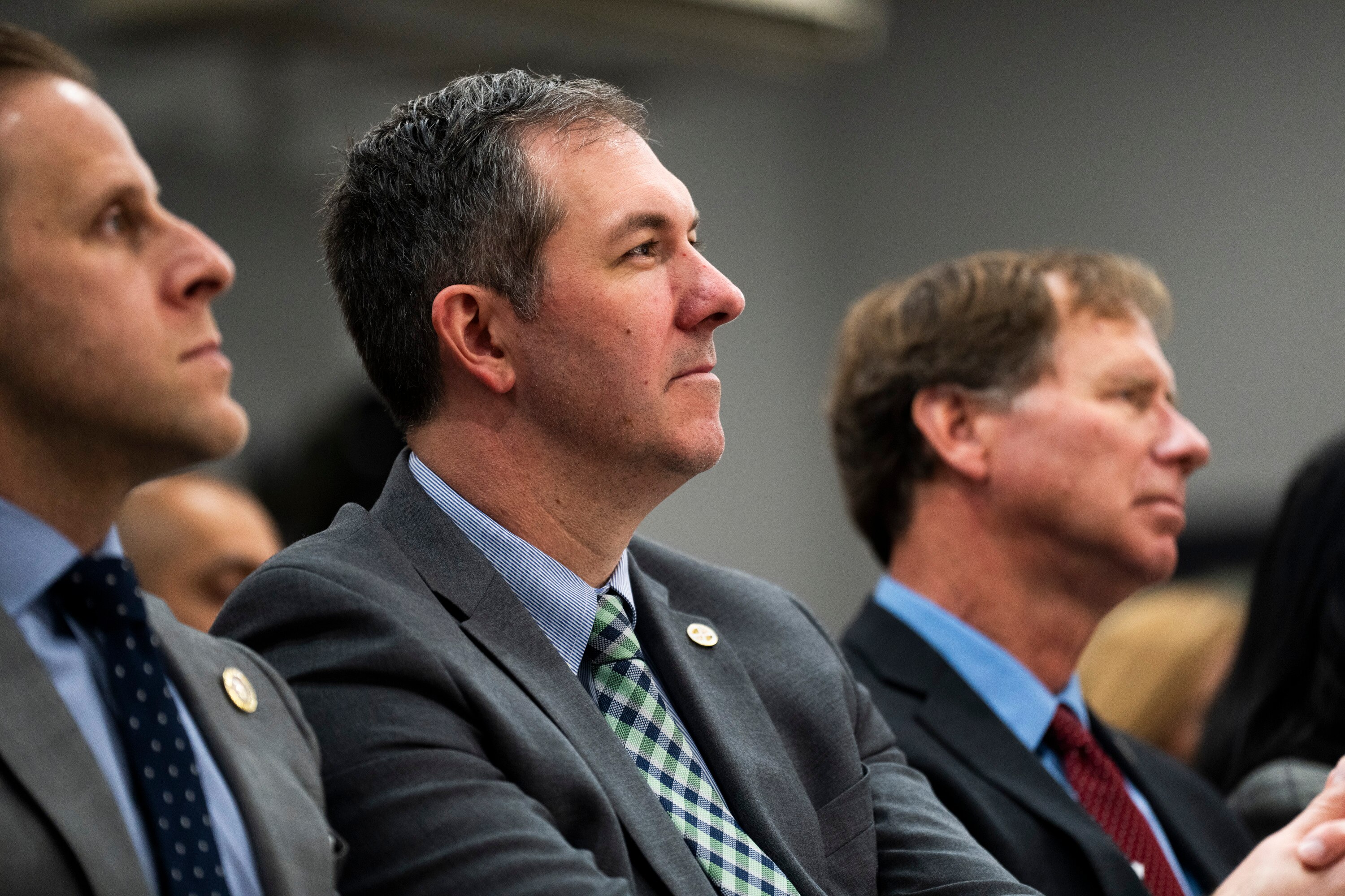 Baltimore County Executive Johnny Olszewski, center, during a press c onference to announce the "ENOUGH" Act on January 29, 2024 in Brooklyn.