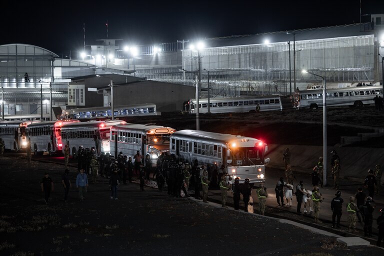TECOLUCA, EL SALVADOR - MARCH 16: In this handout photo provided by the Salvadoran government, view of the inmates allegedly linked to criminal organizations, getting off the buses at CECOT on March 16, 2025 in Tecoluca, El Salvador. Trump's administration deported 238 alleged members of the Venezuelan criminal organizations 'Tren De Aragua' and Mara Salvatrucha with only 23 being members of the Mara. Nayib Bukele president of El Salvador announced that his government will receive the alleged members of the gang to be taken to CECOT. On February of 2023 El Salvador inaugurated Latin America's largest prison as part of President Nayib Bukele's plan to fight gangs. (Photo by Salvadoran Government via Getty Images)
