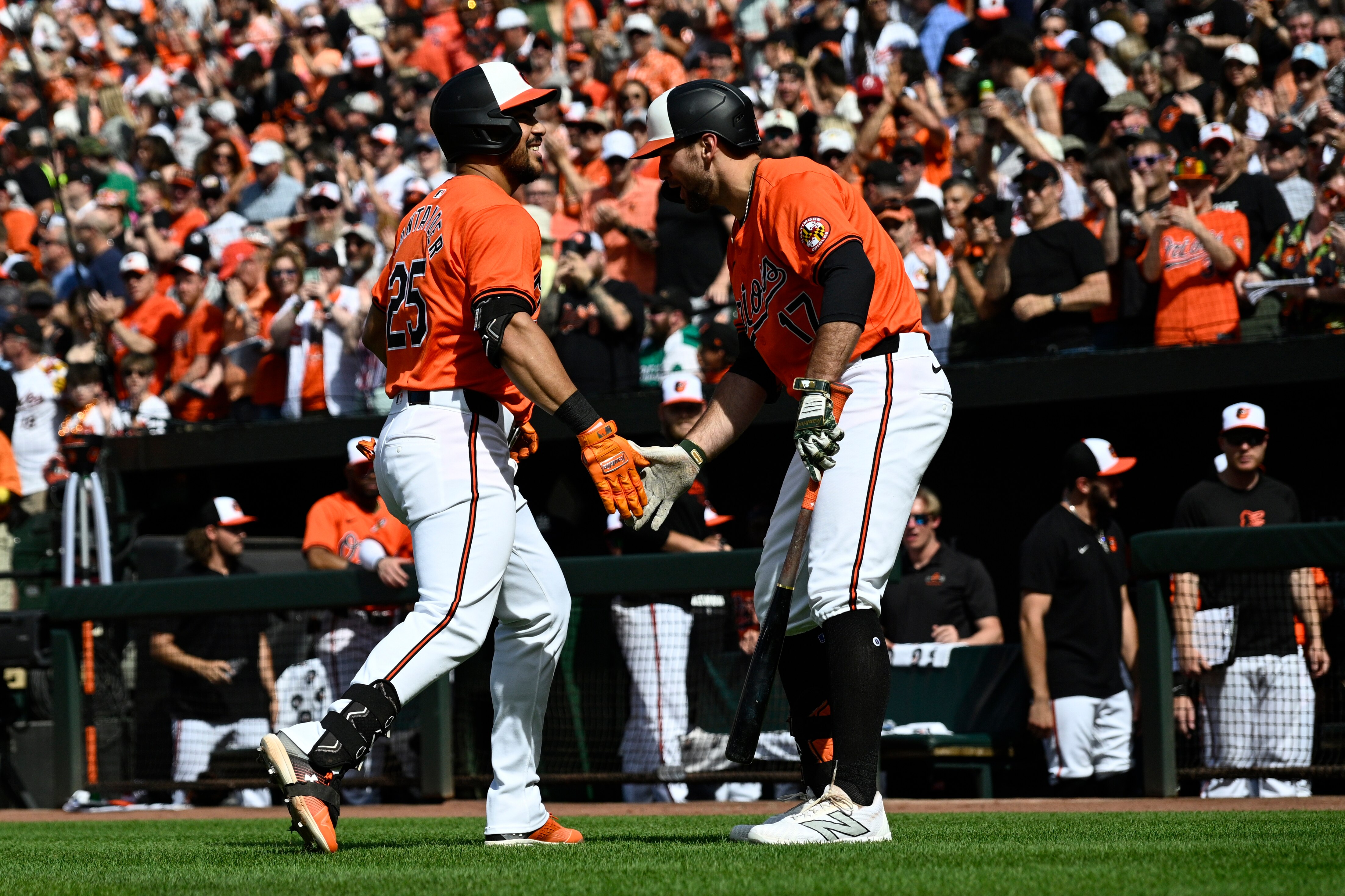 Baltimore Orioles' Anthony Santander (25) celebrates after his home run with Colton Cowser (17) during the first inning of a baseball game against the Tampa Bay Rays, Saturday, June 1, 2024, in Baltimore. (AP Photo/Nick Wass)