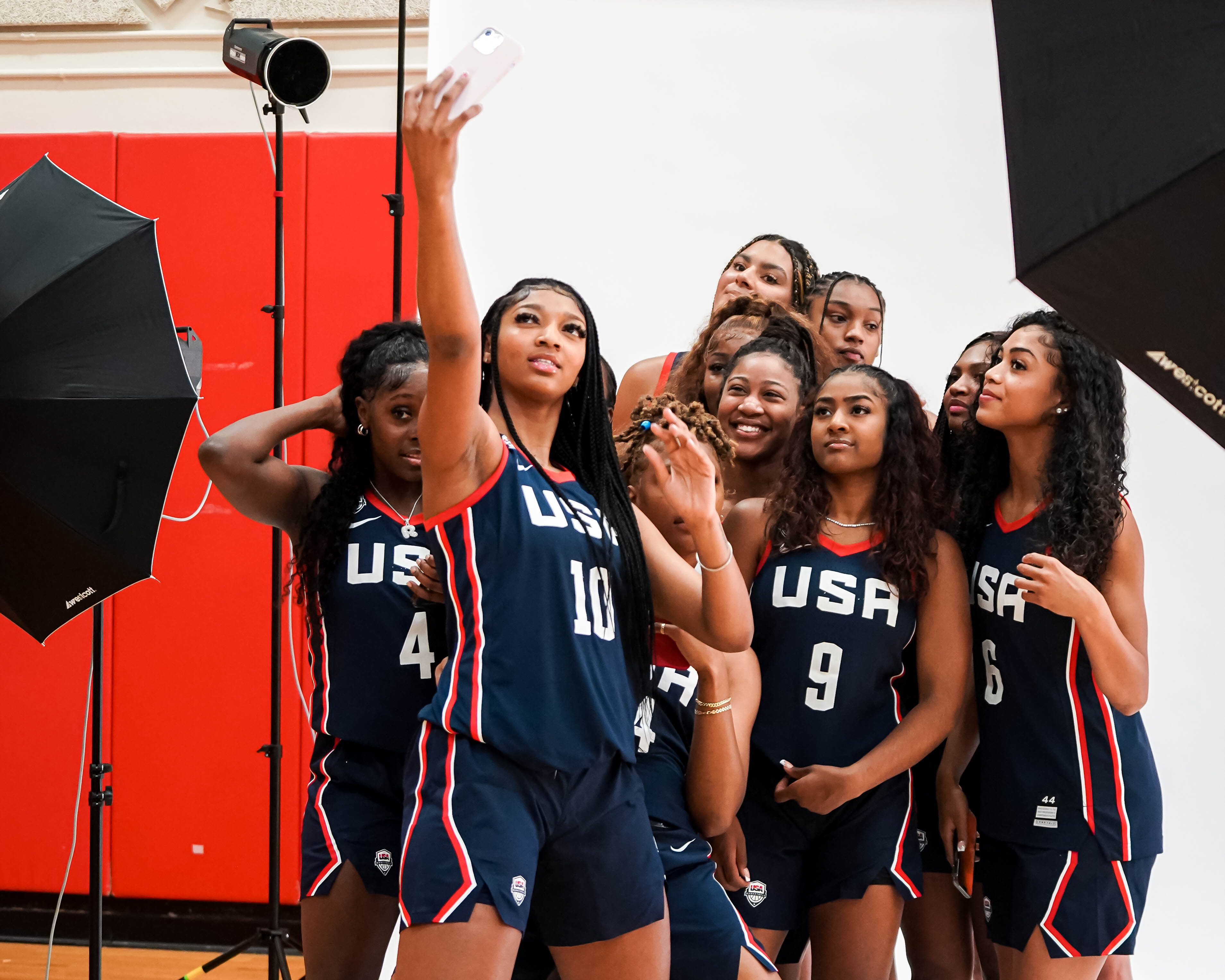 Angel Reese poses with her teammates on the Team USA Americup squad.