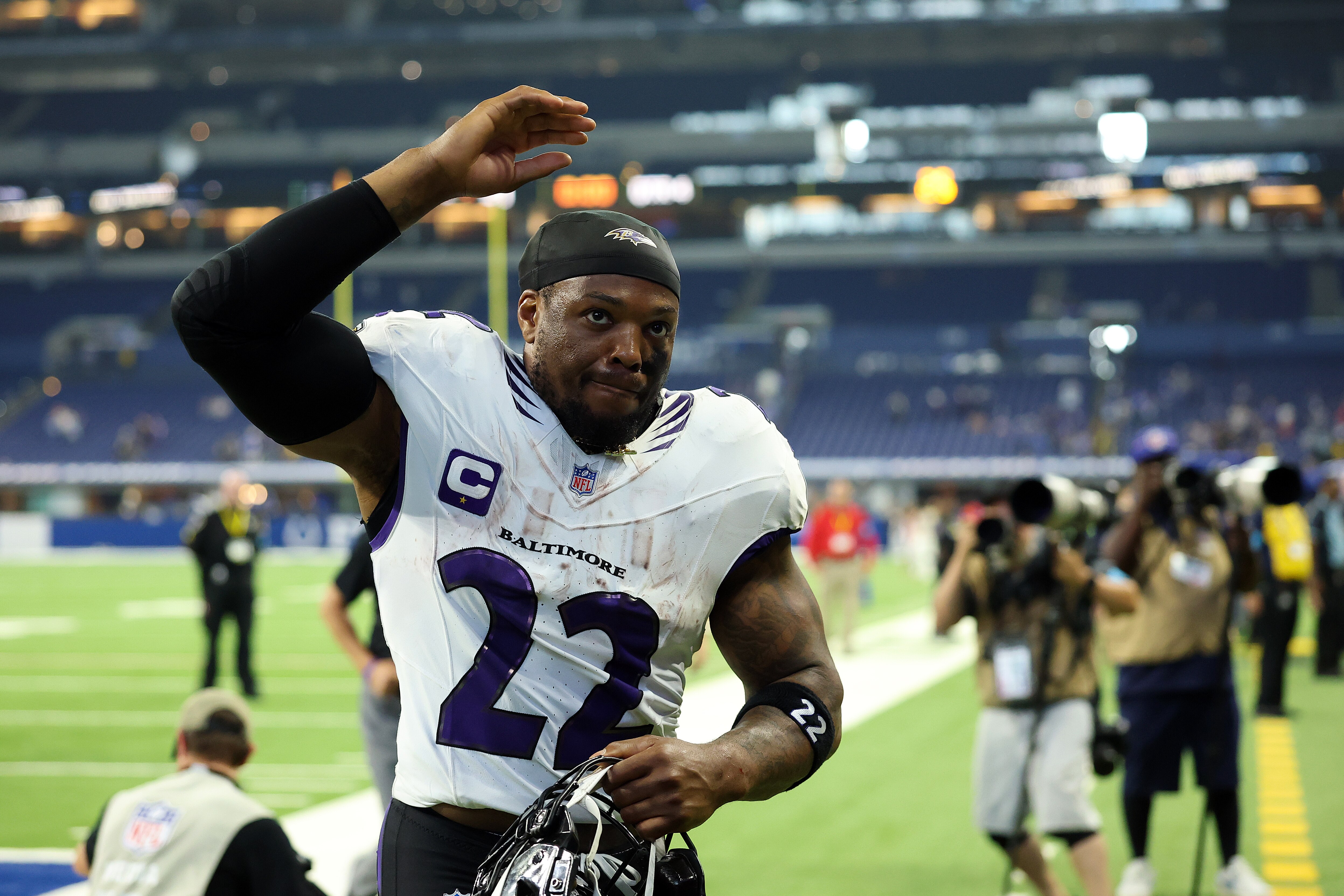 Ravens running back Derrick Henry leaves the field after he ran for 144 yards and three touchdowns against the Colts in the first game of the season. 