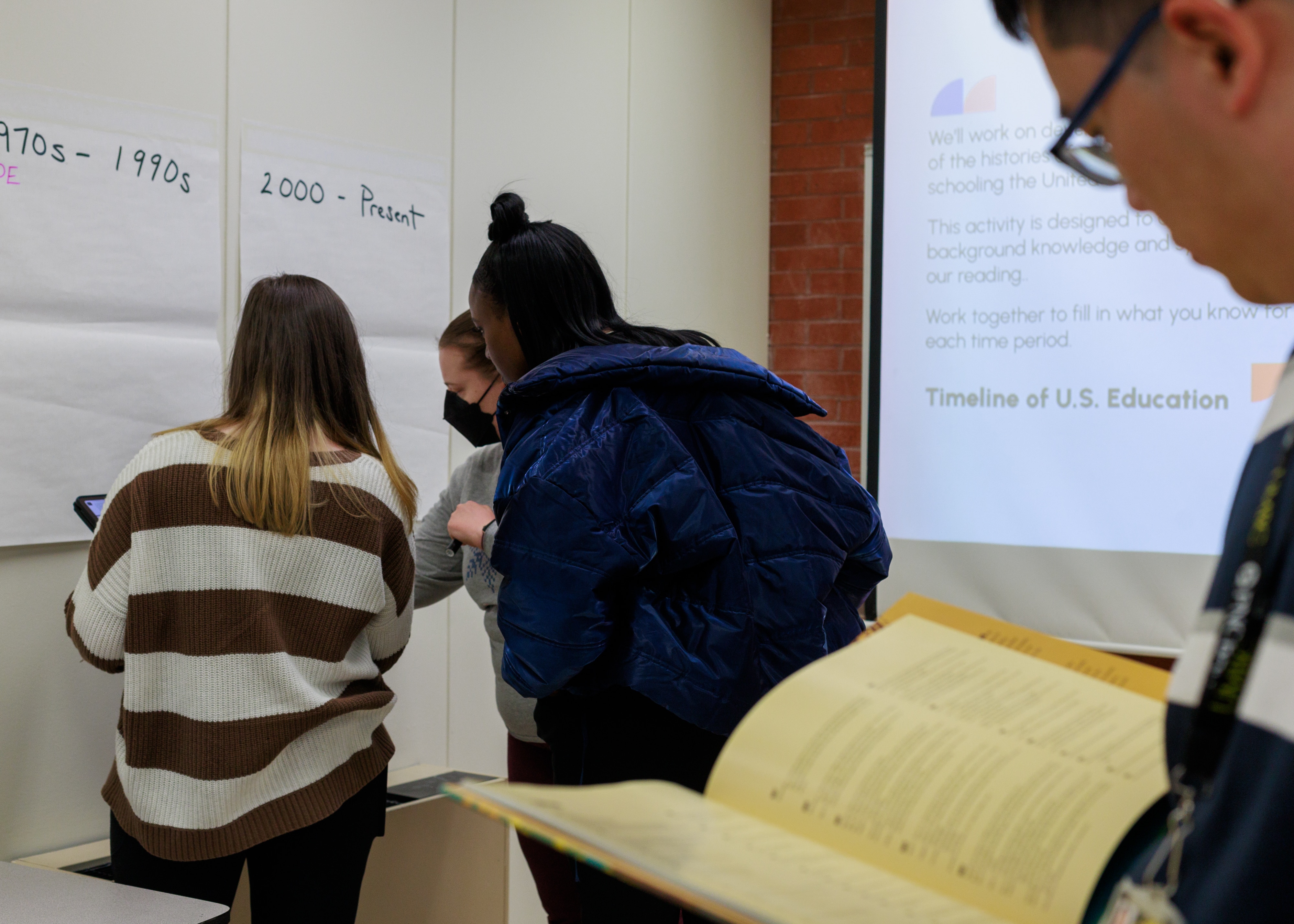 Students, including several conditionally-hired teachers working towards completing their teaching certification, attend a Education in Cultural Perspective course at The University of Maryland, Baltimore County, in Baltimore, MD, taught by Professor Amy Tondreau on Feb. 25, 2025.