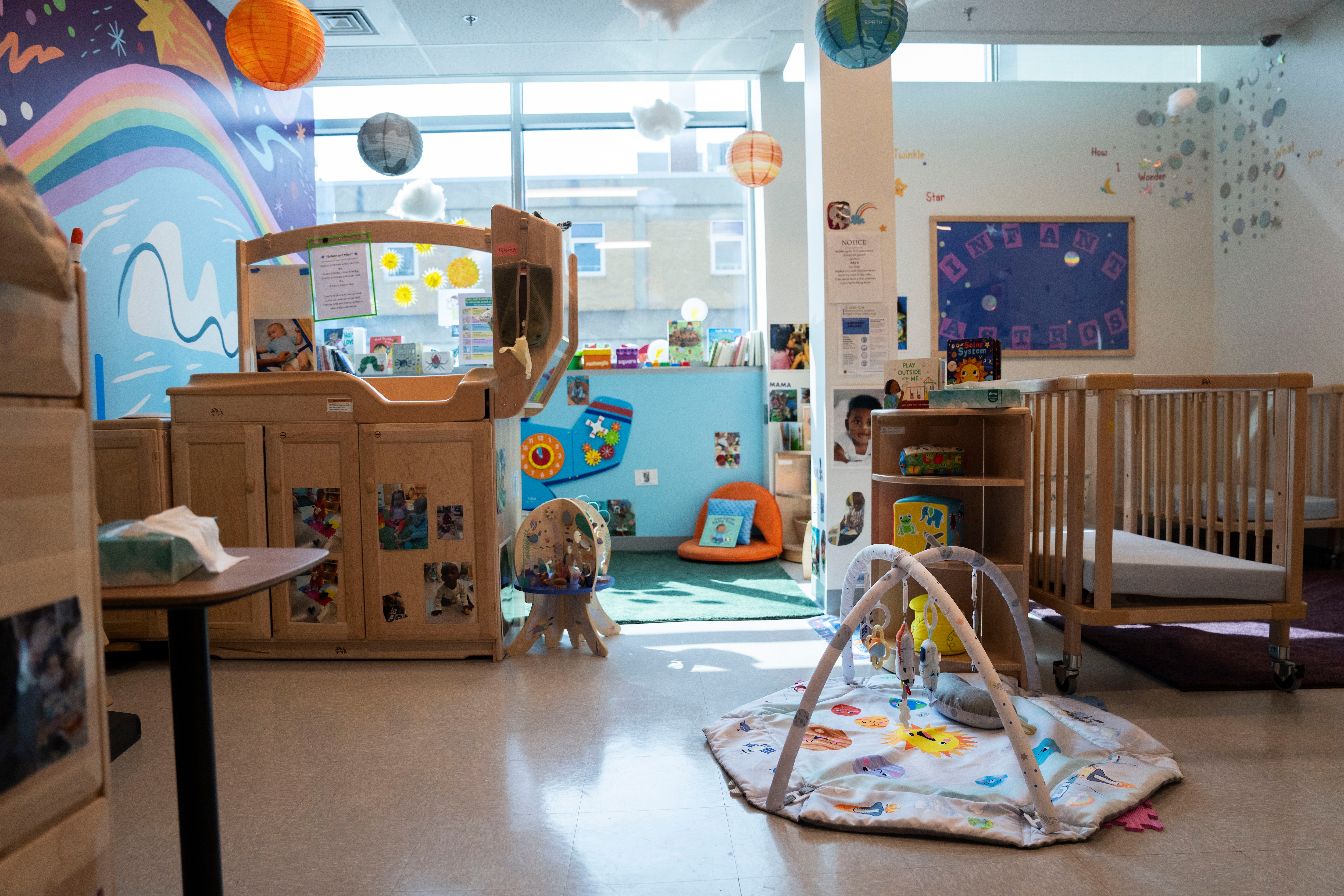 Views and details of the Infant Room at the Rise Early Learning and Family Support Center. The center is apart of the University of Maryland Baltimore School of Social Work, provides free, high-quality early childhood education, family support services, workforce development, and parent education programs all under one roof.