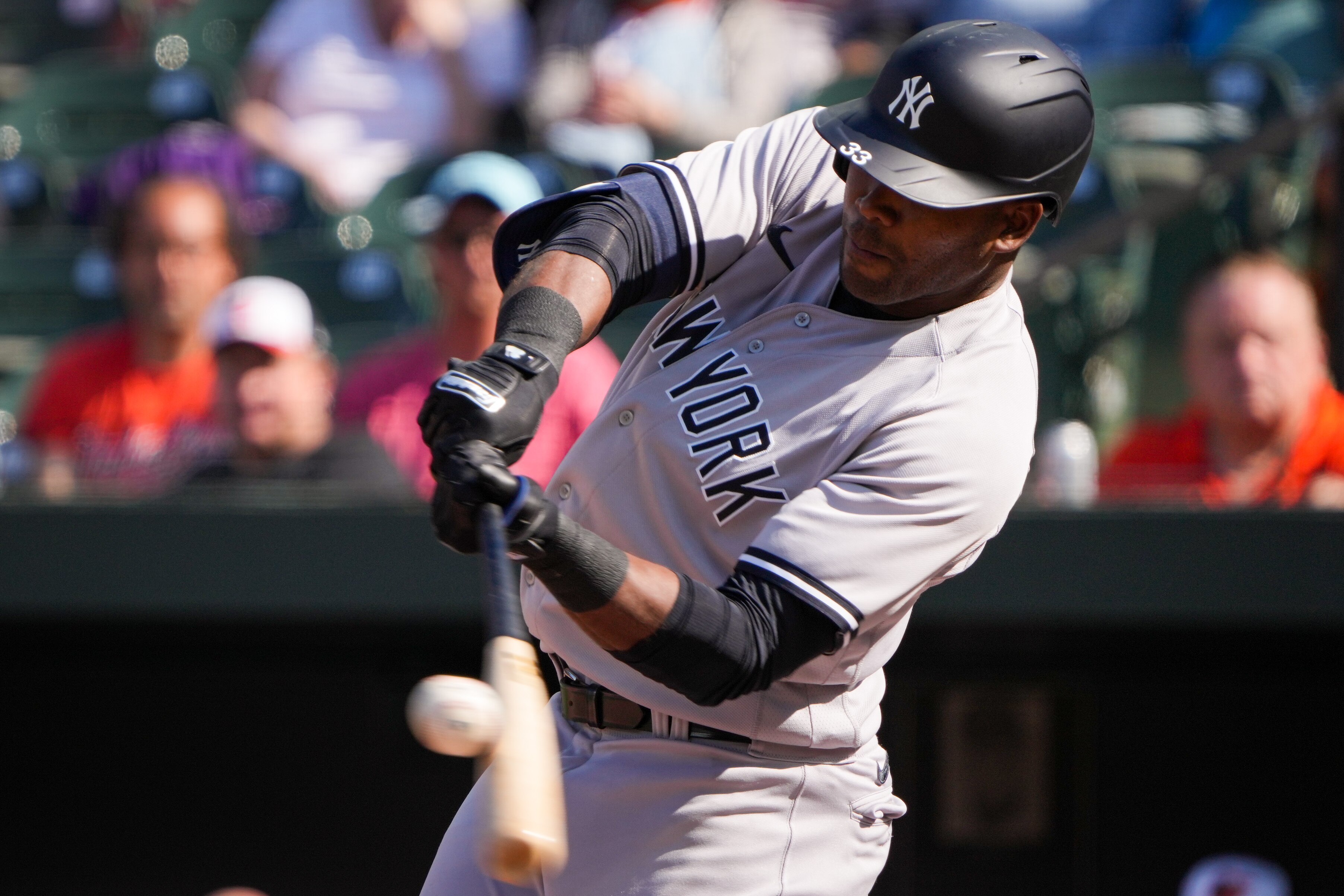 New York Yankees outfielder Franchy Cordero (33) connects with a pitch in the ninth inning of a baseball game against the Baltimore Orioles on Sunday, April 9. Cordero spent spring training in Sarasota, Florida with the Orioles but didn’t end up making the final roster.