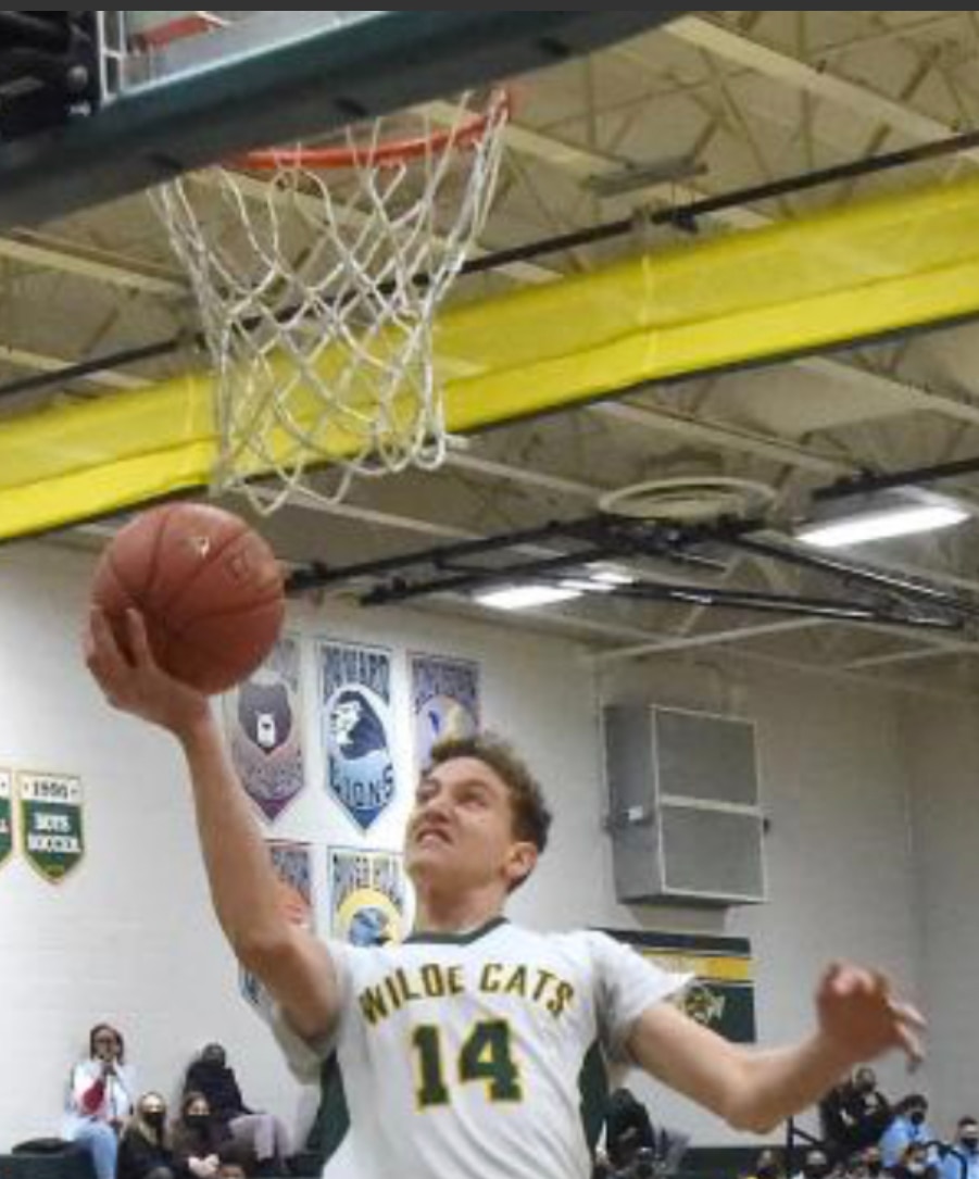 Kain Corkeron helped Wilde Lake boys basketball exact revenge against Long Reach Friday evening. Corkeron's 3-pointer to start overtime sparked the Wildecats to a 75-70 victory over the 14th-ranked Lighnting in Howard County action in Columbia.