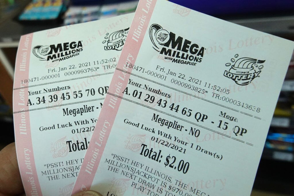 Mega Millions lottery tickets are sold at a 7-Eleven store in the Loop on Jan. 22, 2021 in Chicago, Illinois. The jackpot in the drawing has climbed to $970 million, the third highest in the game’s history.