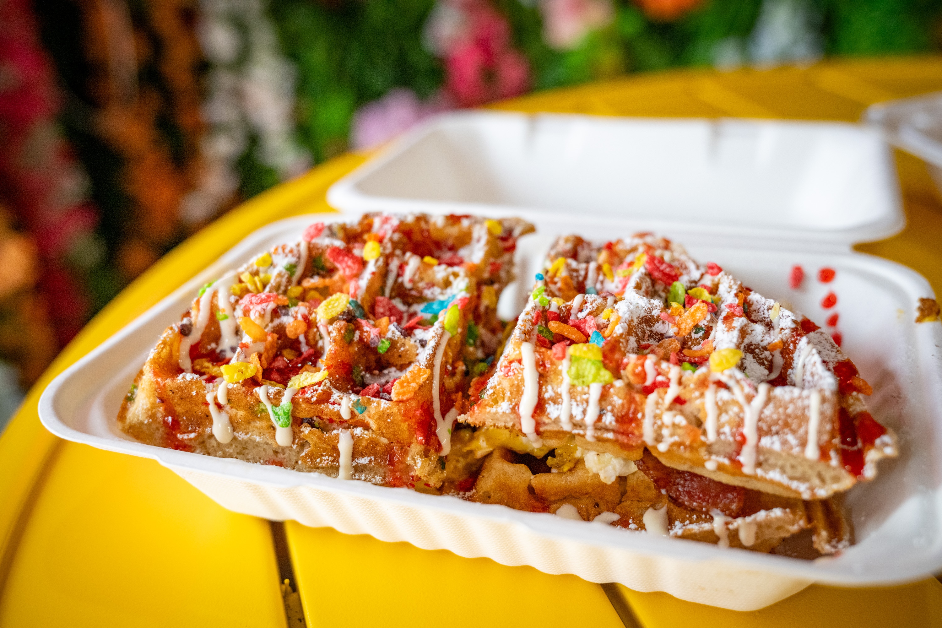 A Fruity Pebbles waffle sandwich with bacon, egg and cheese from Met Her at a Cafe on Aisquith Street.