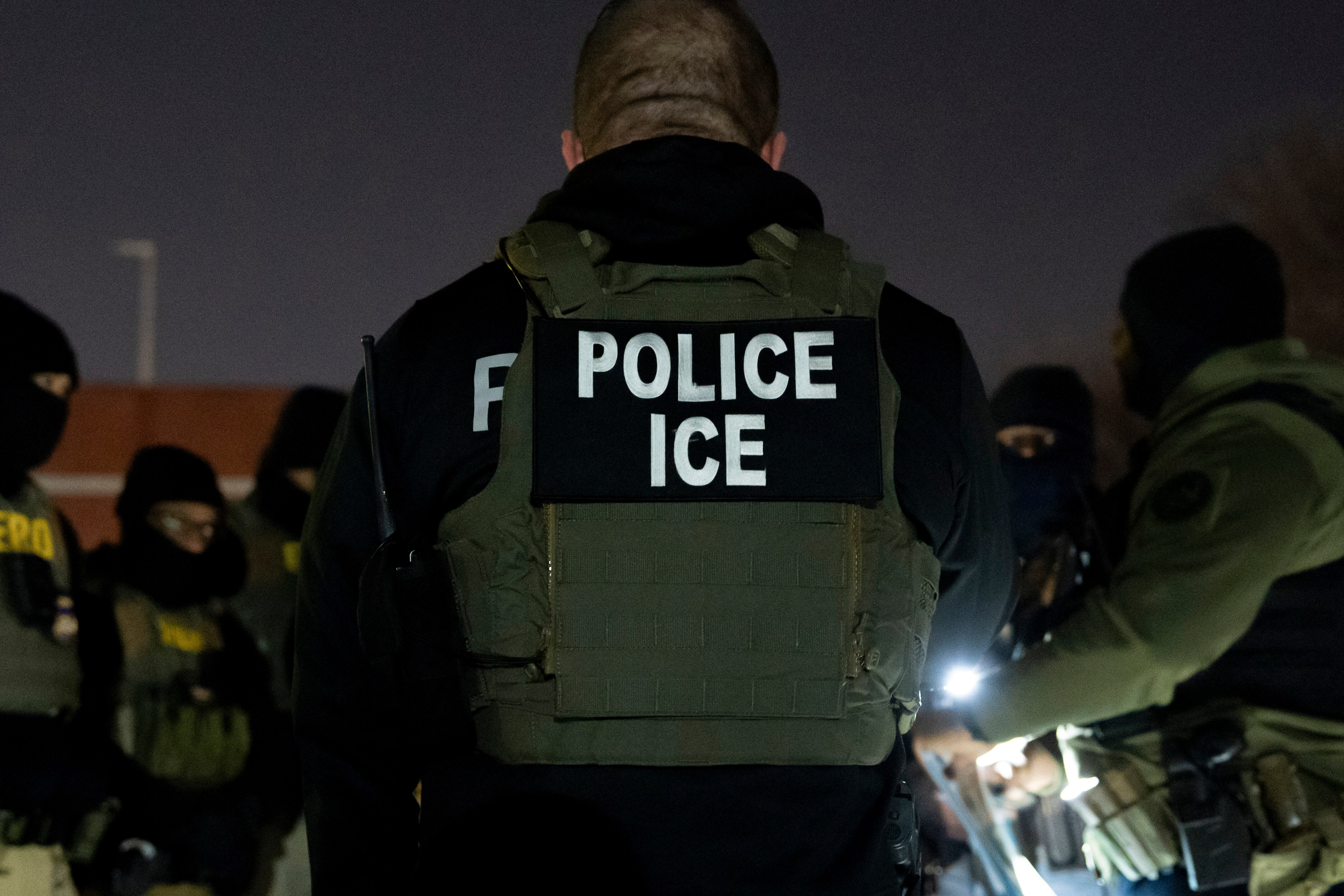 U.S. Immigration and Customs Enforcement officers gather for a briefing before an enforcement operation, Monday, Jan. 27, 2025, in Silver Spring, Md.