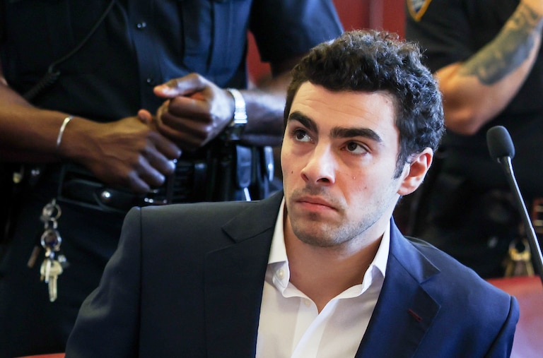FILE - Luigi Mangione appears in Manhattan Criminal Court for an evidence hearing, Dec. 18, 2025, in New York. (Shannon Stapleton/Pool Photo via AP, File)