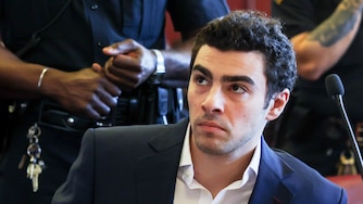 FILE - Luigi Mangione appears in Manhattan Criminal Court for an evidence hearing, Dec. 18, 2025, in New York. (Shannon Stapleton/Pool Photo via AP, File)