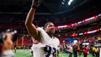 Baltimore Ravens defensive end Calais Campbell (93) walks off the field after an NFL football game against the Atlanta Falcons