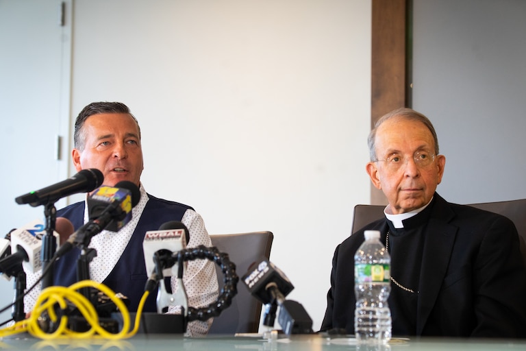 Archbishop William Lori and Paul Jan Zdunek, chair of the Official Committee of Unsecured Creditors, provide updates on the Archdiocese of Baltimore bankruptcy case at a press conference held at Brown, Goldstein & Levy in Baltimore on July 8, 2024.