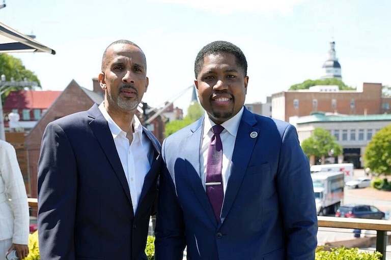 Rapper Mac Phipps, left, and Del. Marlon Amprey, after the signing of Maryland's Protecting Artists’ Creative Expression (PACE) Act on May 12.