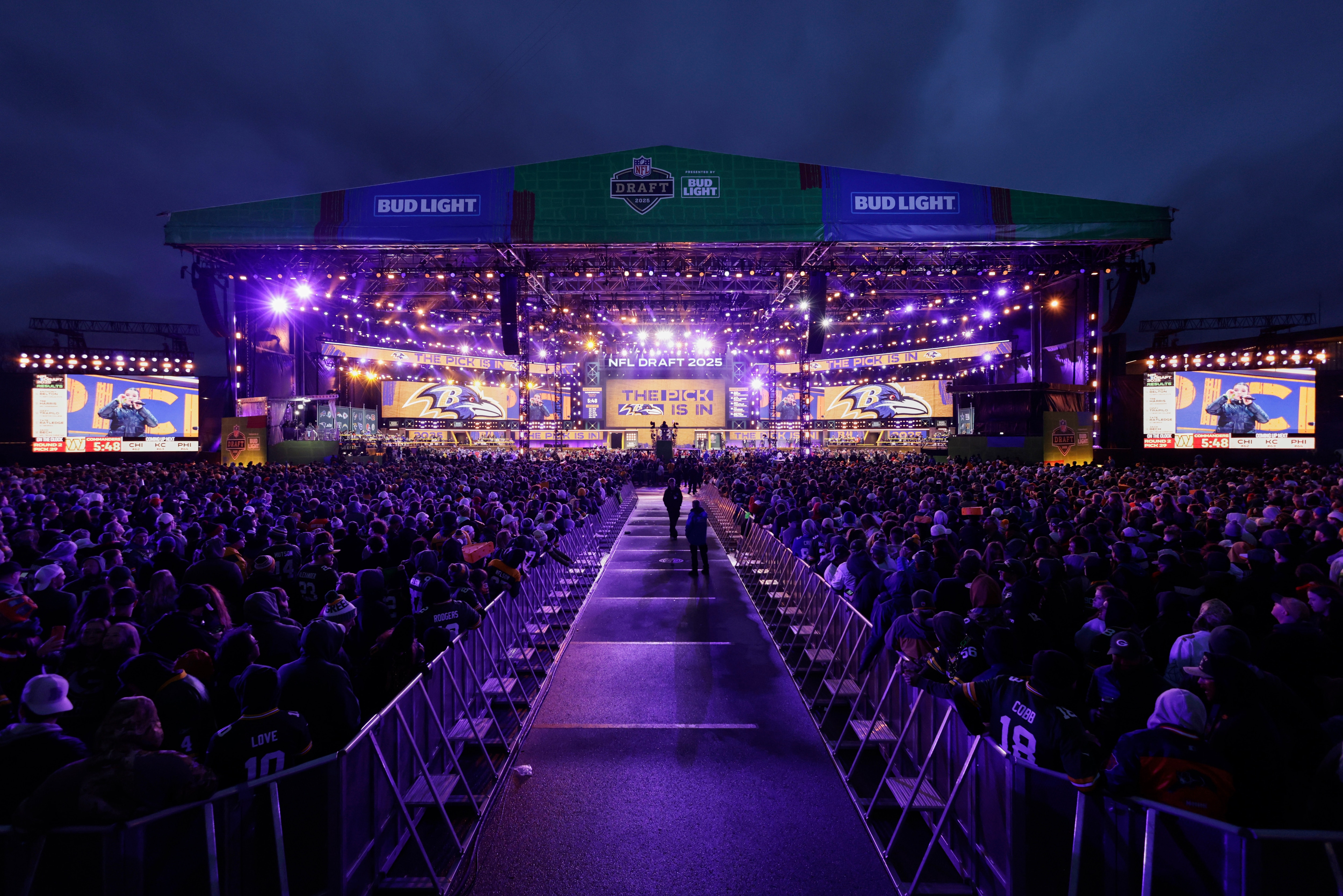 Fans watch during the second round of the NFL football draft, Friday, April 25, 2025, in Green Bay, Wis.